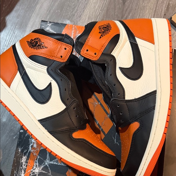 Jordan High-Top Sneakers in Black, Orange, and White